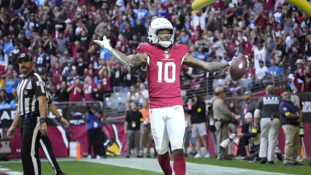 Nov 27, 2022; Glendale, AZ, USA; Arizona Cardinals wide receiver DeAndre Hopkins (10) celebrates after a touchdown catch against the Los Angeles Chargers during the first quarter at State Farm Stadium. Nfl Arizona Cardinals Vs Los Angeles Chargers Los Angeles Chargers At Arizona Cardinals